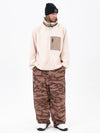 Pantalon de ski ample et zippé en polaire sherpa synthétique pour homme, avec genoux renforcés.
