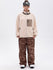 Pantalon de ski ample et fluide pour femme, en polaire imitation sherpa avec fermeture éclair intégrale et genoux renforcés.