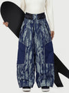 Pantalon de neige super ample Wild Motion pour femme, multipoches, à blocs de couleurs réfléchissants.