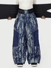 Pantalon de neige super ample Wild Motion pour femme, multipoches, à blocs de couleurs réfléchissants.