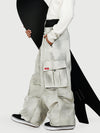 Pantalon de neige cargo ample et fonctionnel pour homme, avec ceinture utilitaire et poches multiples.