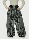 Pantalon de neige super ample Wild Motion pour femme, multipoches, à blocs de couleurs réfléchissants.