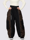 Pantalon de neige extra ample Wild Motion pour femme, à blocs de couleurs réfléchissants.