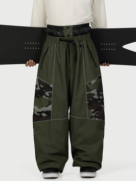 Pantalon de ski Wild Motion pour homme, multipoches, à blocs de couleurs réfléchissants et très ample.