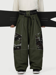 Pantalon de ski Wild Motion pour homme, multipoches, à blocs de couleurs réfléchissants et très ample.
