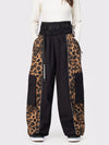 Pantalon de neige extra ample Wild Motion pour femme, à blocs de couleurs réfléchissants.