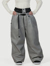 Pantalon de neige ample OG pour femme, style urbain et inspiré des vêtements de travail, avec rivets apparents.