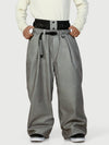 Pantalon de neige ample OG pour homme, style urbain, inspiré des vêtements de travail, avec rivets apparents et coupe large.
