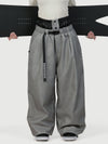 Pantalon de neige ample OG pour femme, style urbain et inspiré des vêtements de travail, avec rivets apparents.