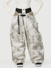 Pantalon de neige ample OG pour femme, style urbain et inspiré des vêtements de travail, avec rivets apparents.
