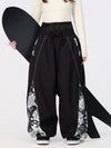 Pantalon de jogging ample pour femme, style jogging, avec empiècements et bandes réfléchissantes, style graffiti, couleur Hyper Flux.