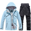 Ensemble veste et pantalon de ski isolés pour homme, idéal pour la montagne.