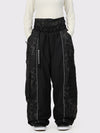 Pantalon de neige extra ample Wild Motion pour femme, à blocs de couleurs réfléchissants.