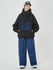 Combinaison de snowboard ample pour femme, style freeride.