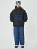 Combinaison de snowboard ample pour homme, style freeride.