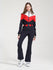 Combinaison de ski Gsou Snow Retro pour femme, à ceinture et jambes évasées colorées.